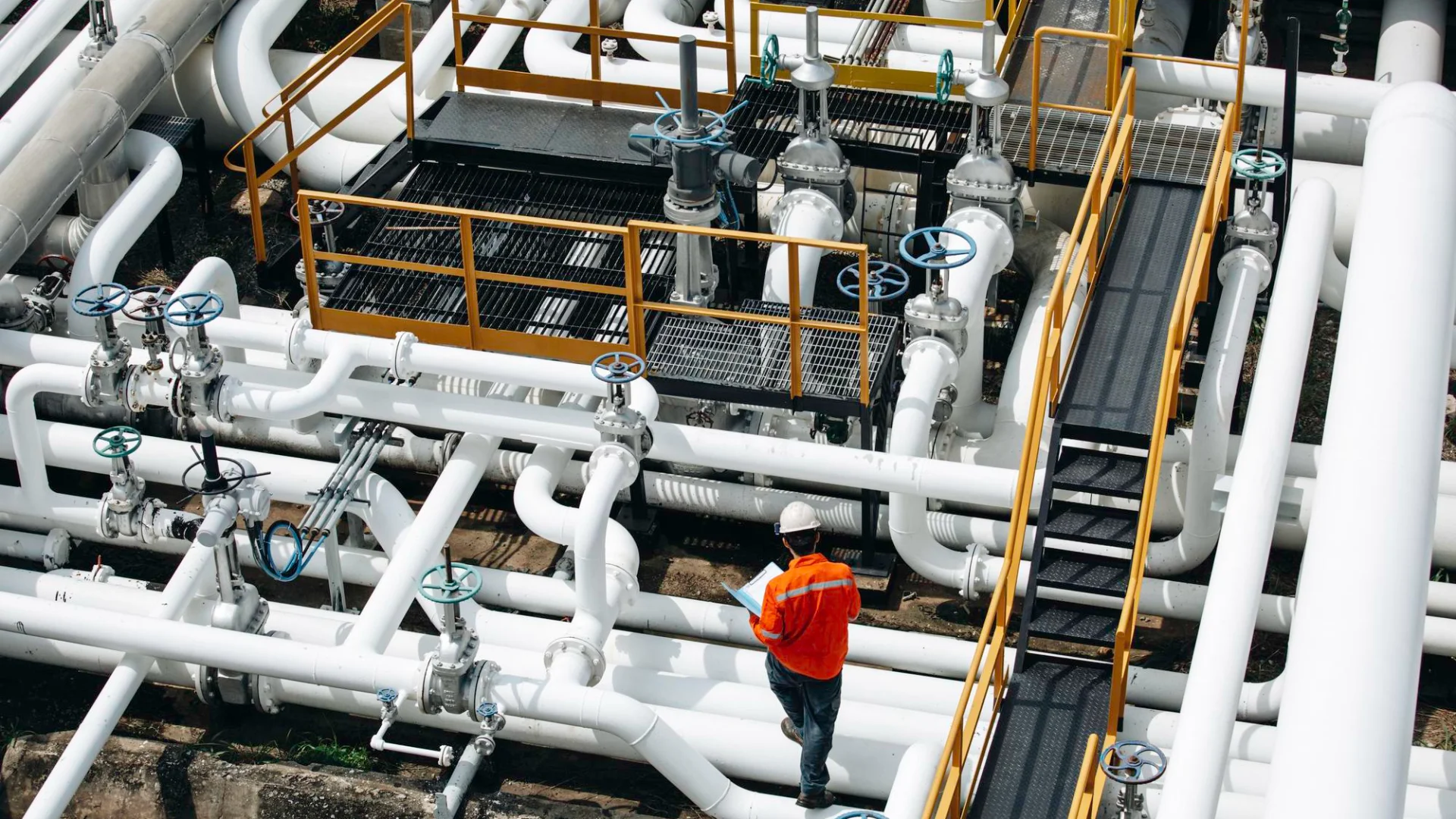 top-view-male-worker-inspection-valve-visual-check-record-pipeline-oil-gas-industry.jpg